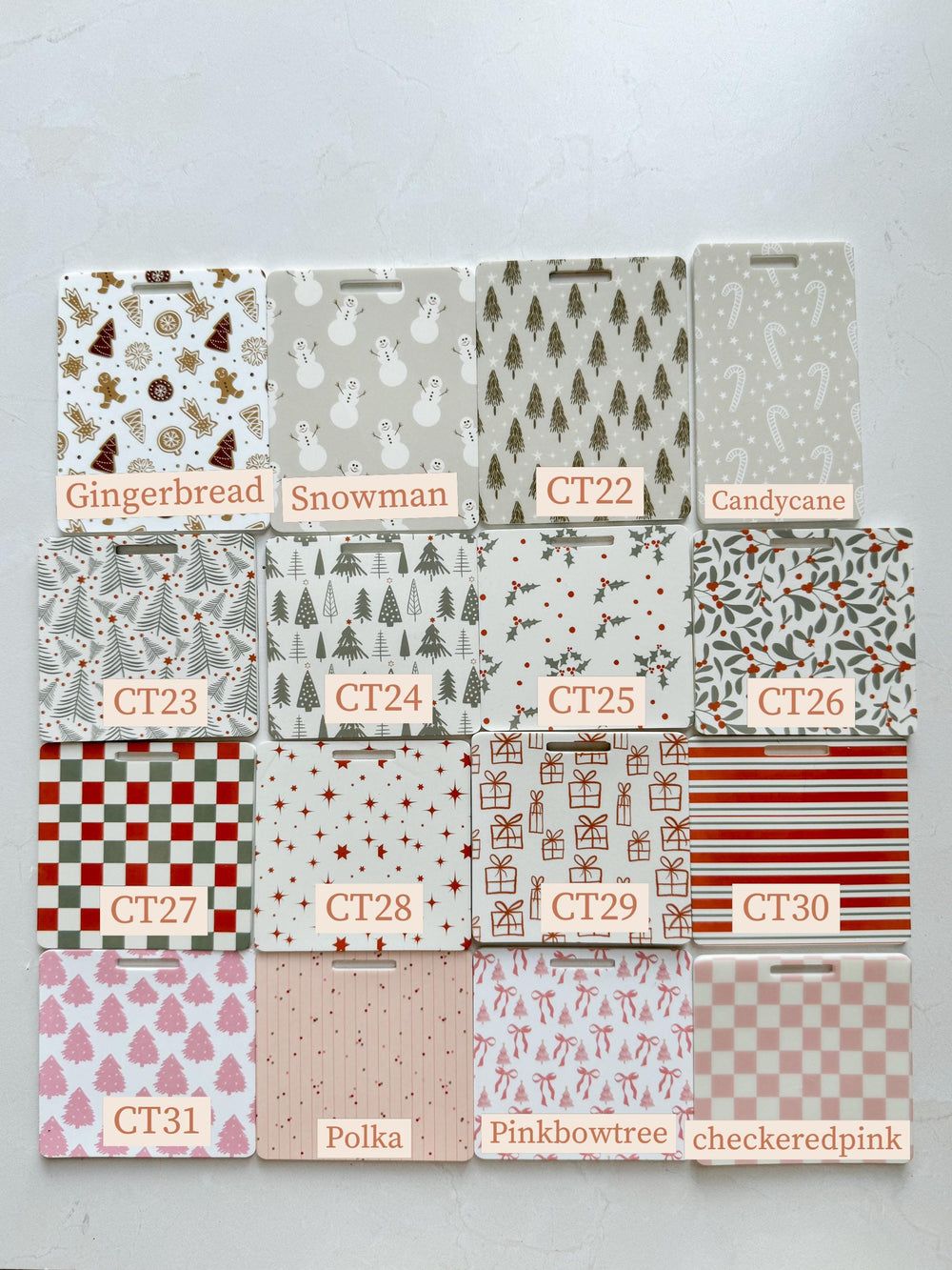 A set of 12 Christmas themed printable gift tags with various patterns, including gingerbread, snowman, candy canes, trees, stars, polka dots, and checkered patterns. The tags are labeled with the nam