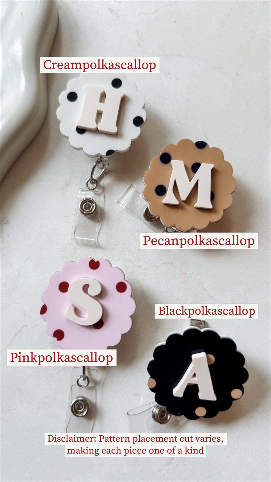 Four badge reels with scalloped edges and polka dots. The reels are white, tan, pink, and black, each with a different letter: H, M, S, and A. The text "Creampolkascallop", "Pecanpolkascallop", "Pinkp