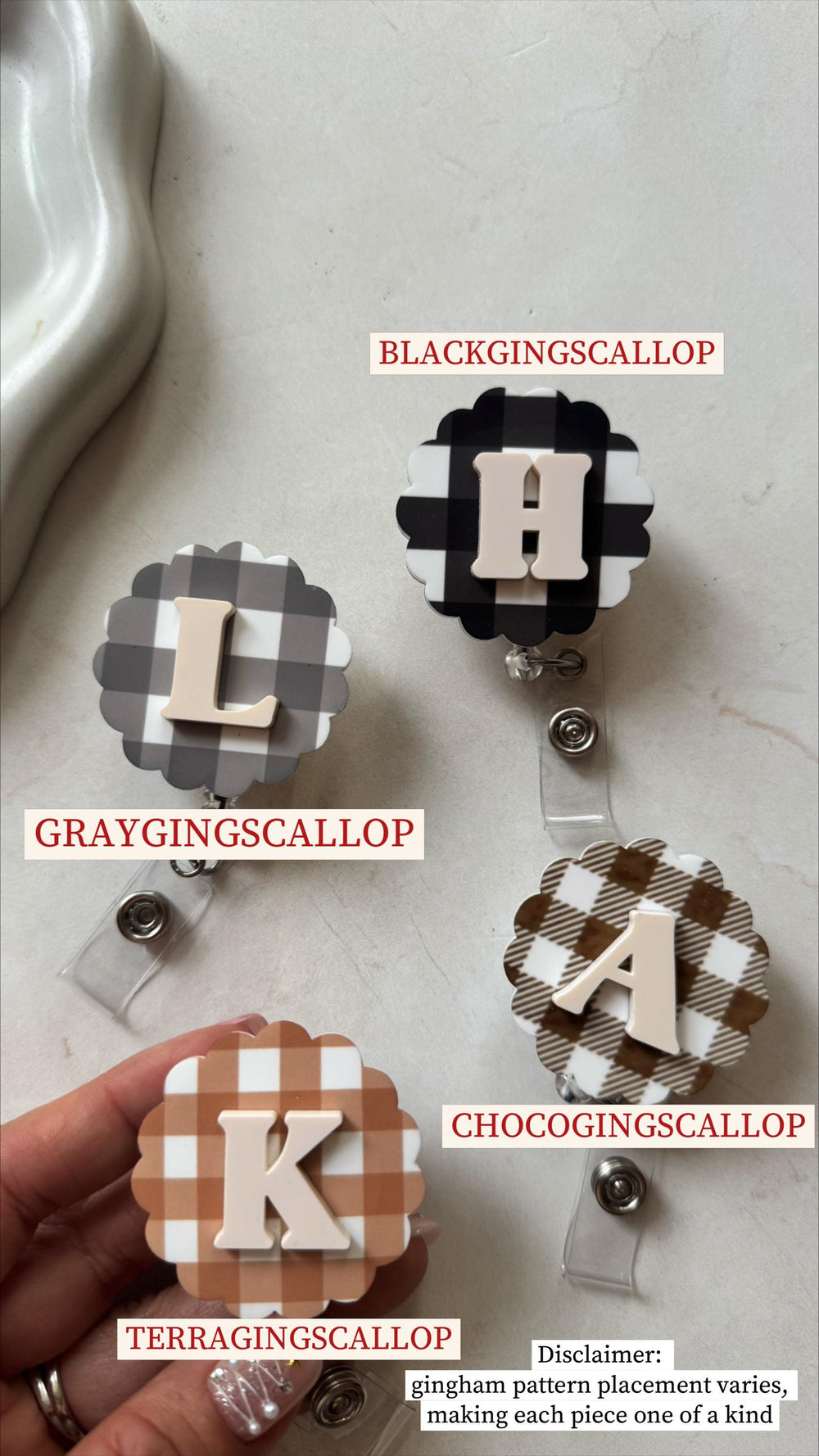 Four scalloped badge reels with gingham patterns in black, gray, brown, and tan. Each reel features a different letter: H, L, A, and K, in a neutral color. The text "BLACKGINGSCALLOP", "GRAYGINGSCALLO