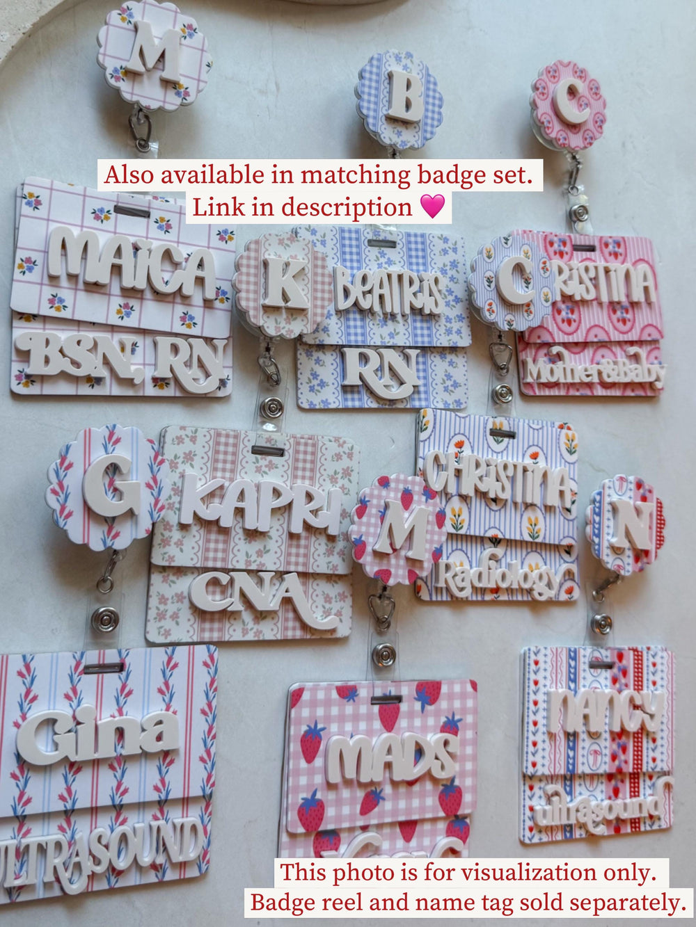 A collection of personalized badge reels and name tags. The designs feature floral, gingham, and strawberry patterns in pink, blue, and white. Each tag displays a name and title in white, 3D lettering