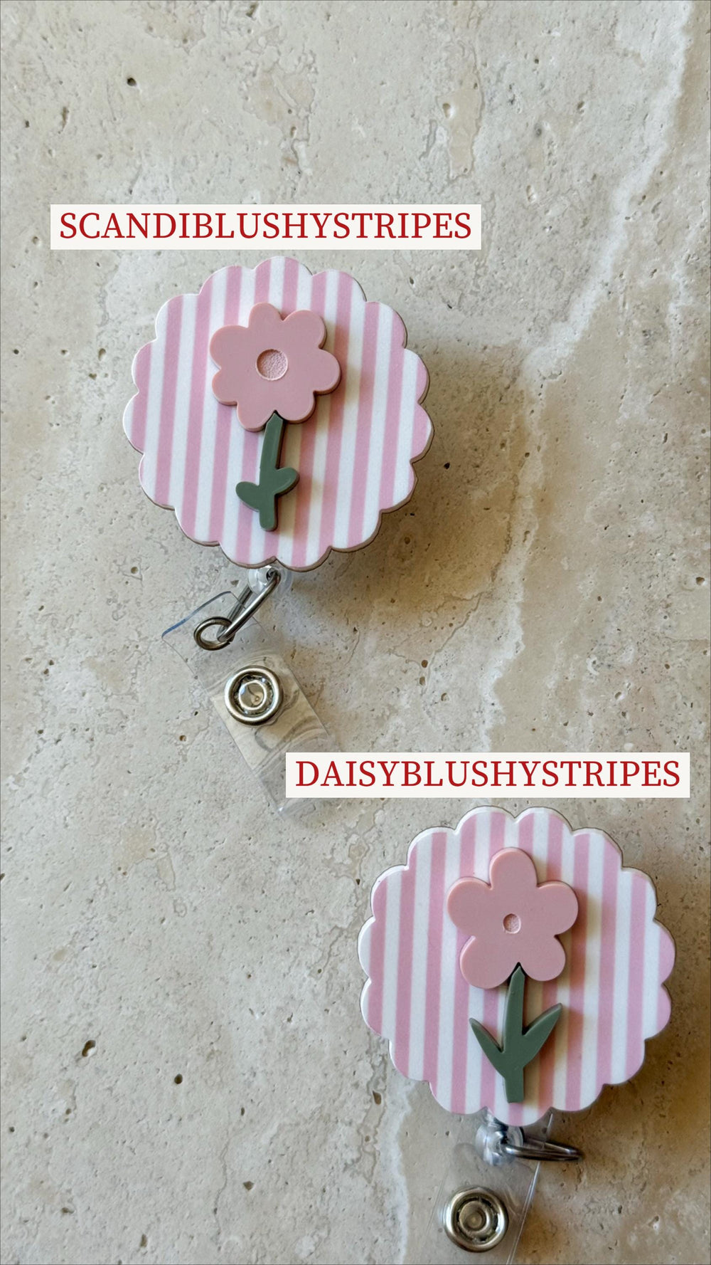 Two retractable badge holders with a pink and white striped design and a pink flower accent. The text "SCANDIBLUSHYSTRIPES" and "DAISYBLUSHYSTRIPES" are visible. The badge holders have a clear plastic