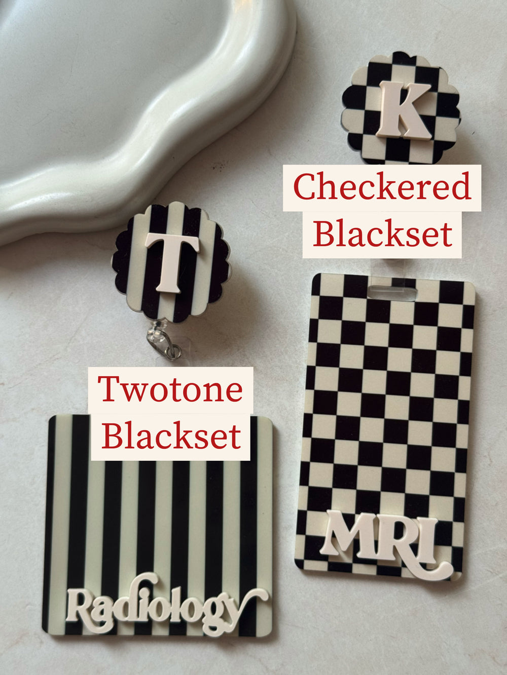 Checkered black badge buddy and reel set, stripes black badge reel and id holder
